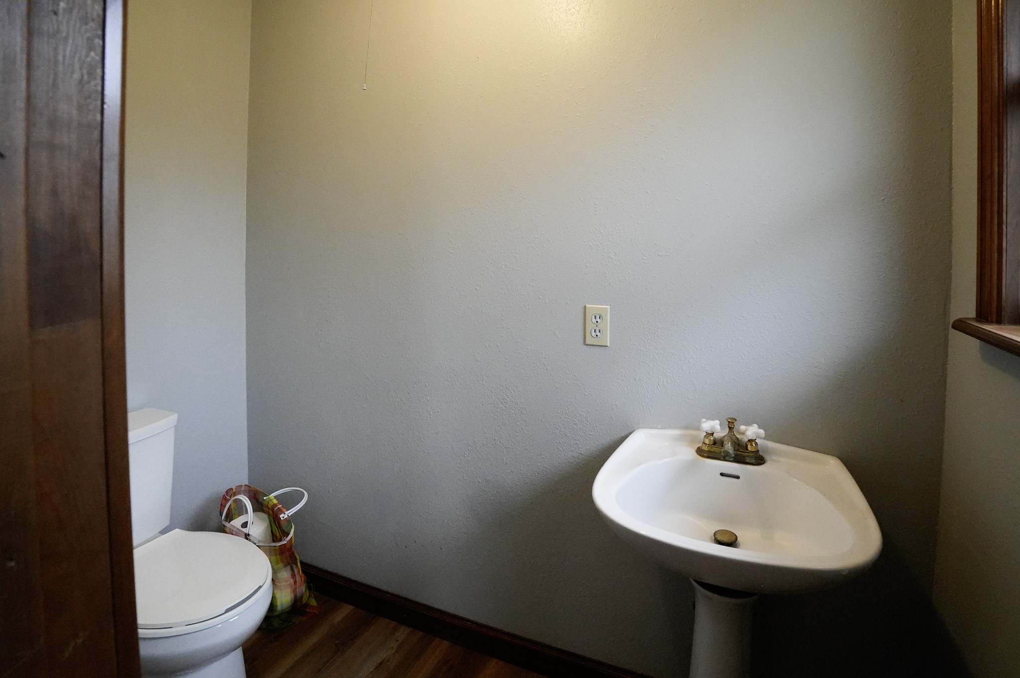 4731 Krischke Road Schulenburg, TX 78956 - Photo 31 of 40 a bathroom with a sink mirror and toilet