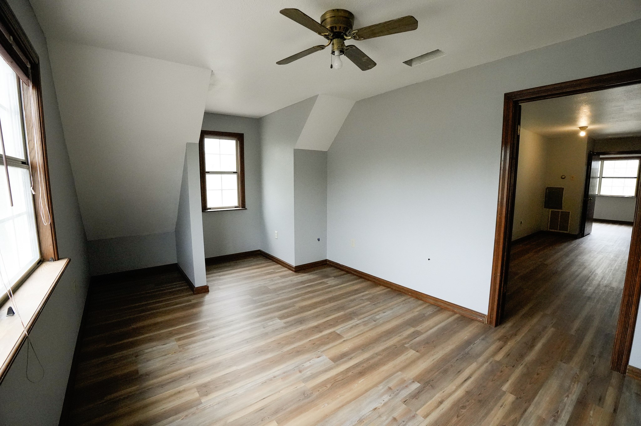 4731 Krischke Road Schulenburg, TX 78956 - Photo 36 of 40 a view of empty room with wooden floor and fan