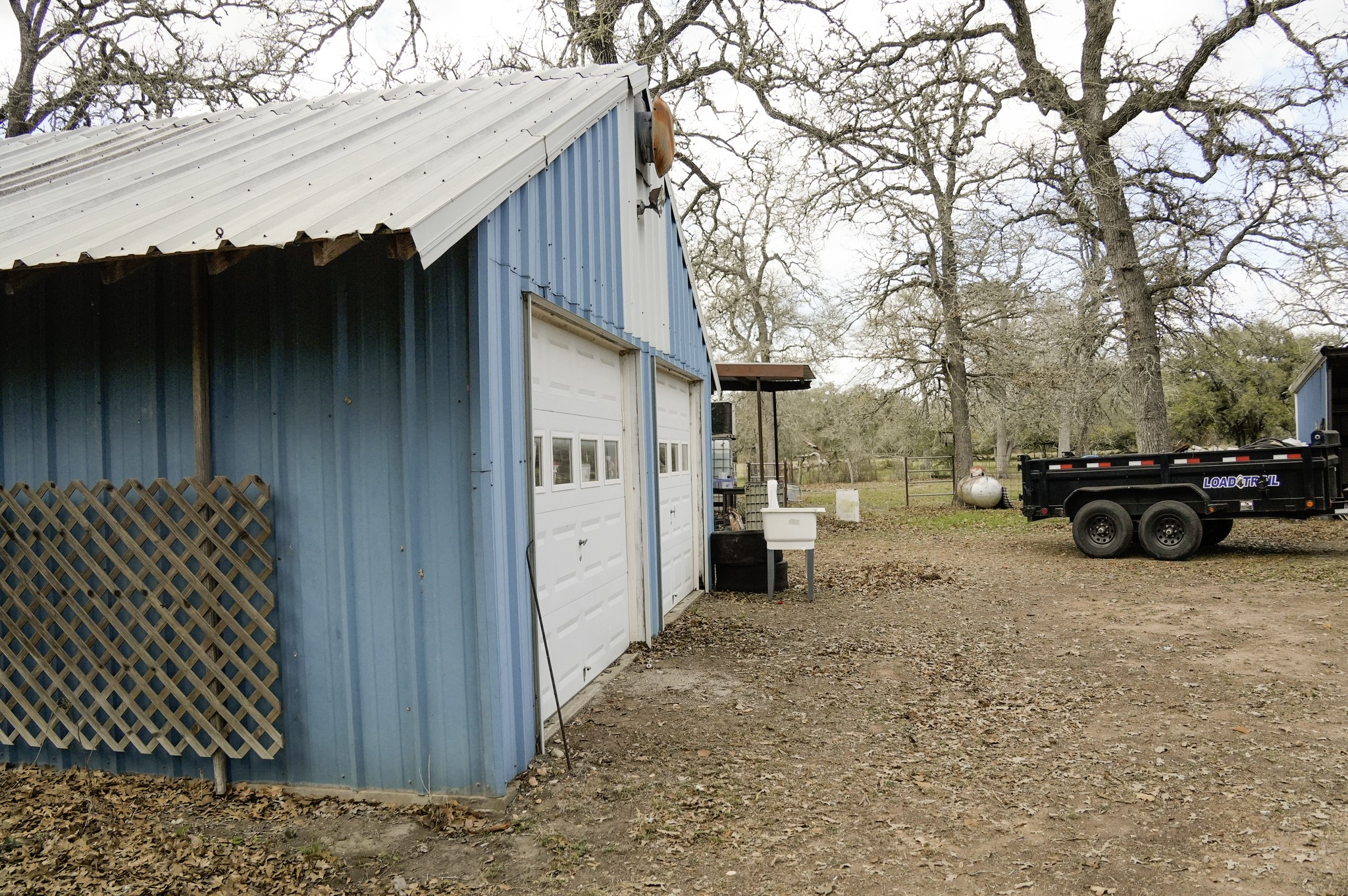 4731 Krischke Road Schulenburg, TX 78956 - Photo 5 of 40 a view of a house with a yard covered in snow