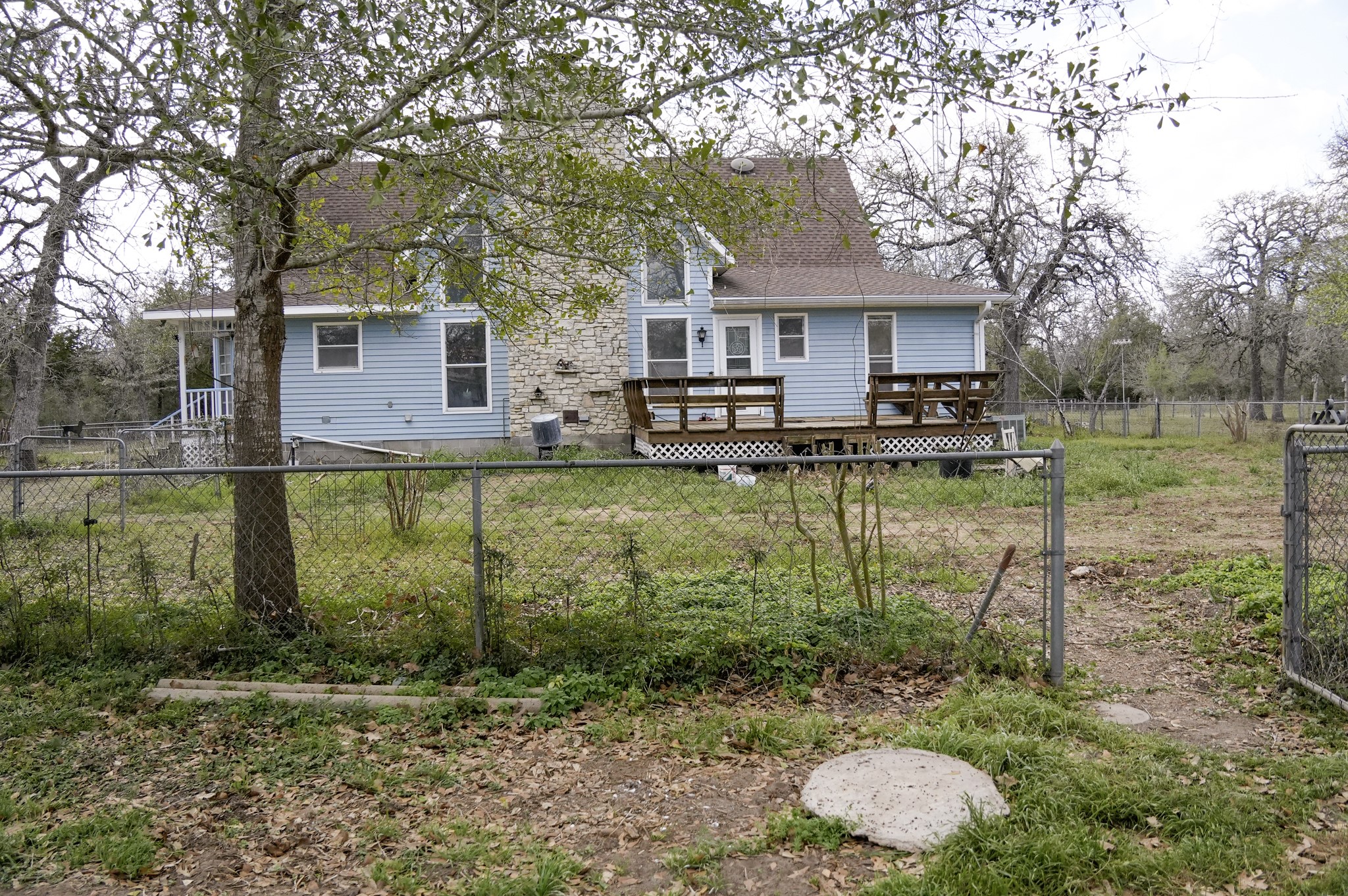 4731 Krischke Road Schulenburg, TX 78956 - Photo 9 of 40 a front view of a house with garden