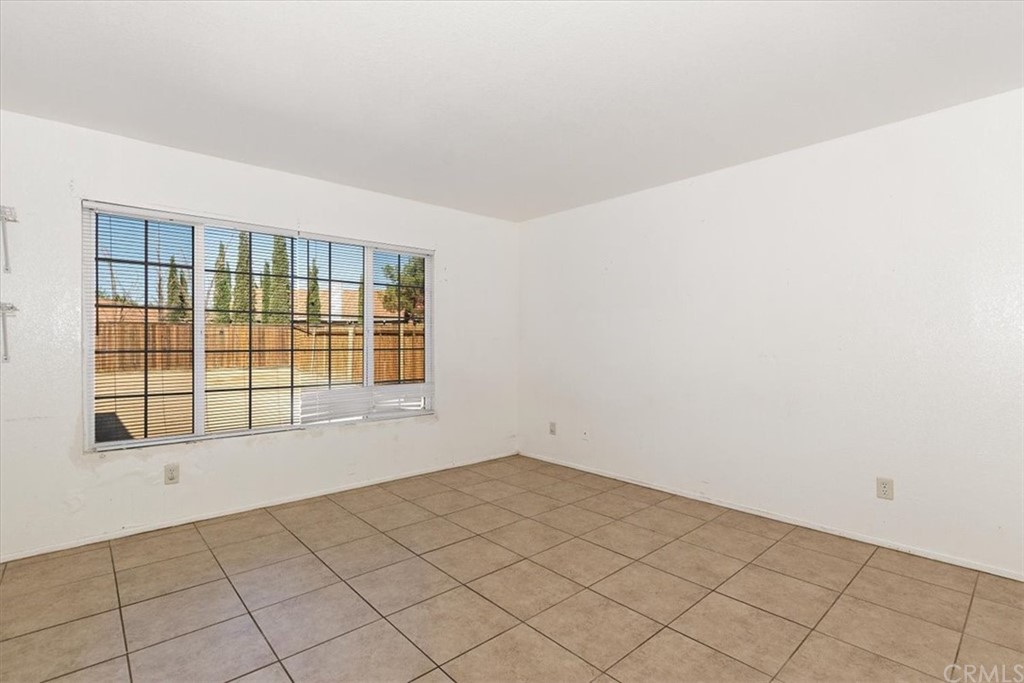 14560 Juniper Lane Adelanto, CA 92301 - Photo 14 of 25 a view of an empty room and window