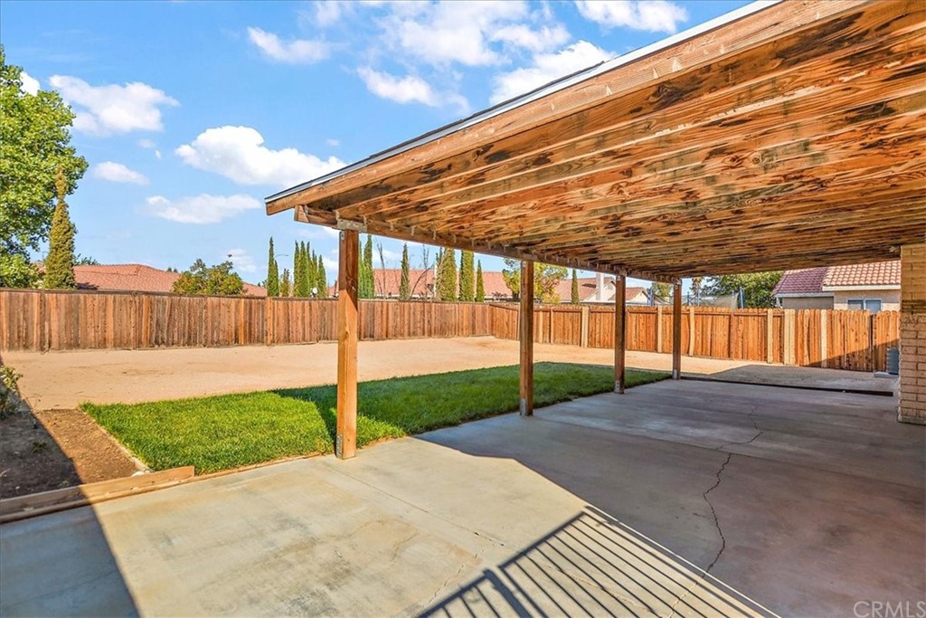 14560 Juniper Lane Adelanto, CA 92301 - Photo 22 of 25 a view of a backyard