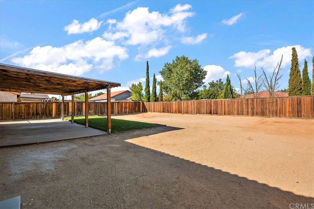 14560 Juniper Lane Adelanto, CA 92301 - Photo 25 of 25 a view of a backyard