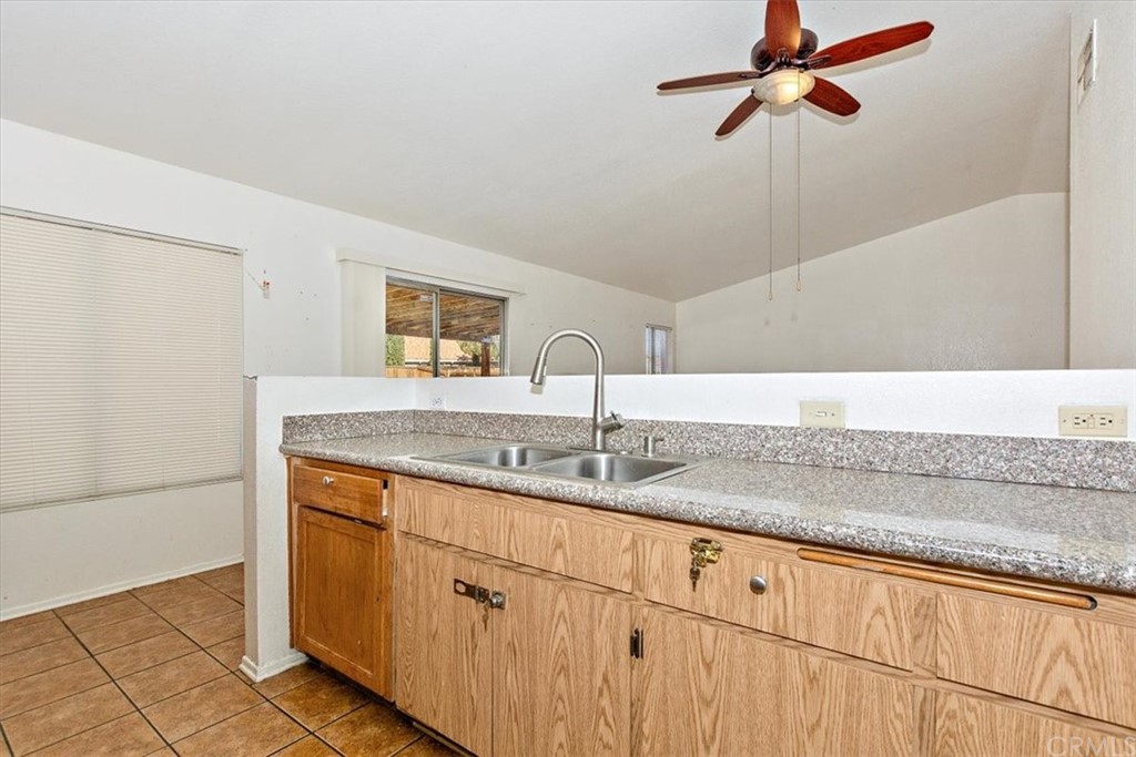 14560 Juniper Lane Adelanto, CA 92301 - Photo 10 of 25 a bathroom with a sink and a mirror