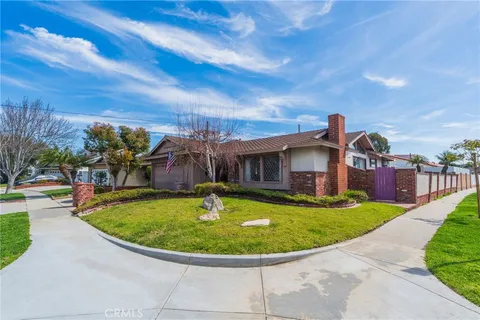 a view of a house with a swimming pool