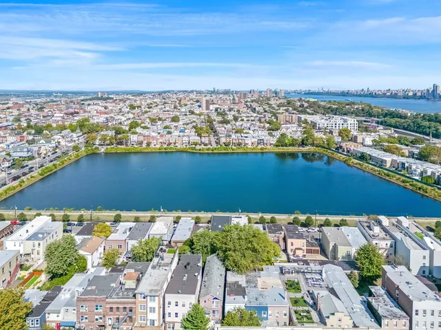 a view of a city with tall buildings