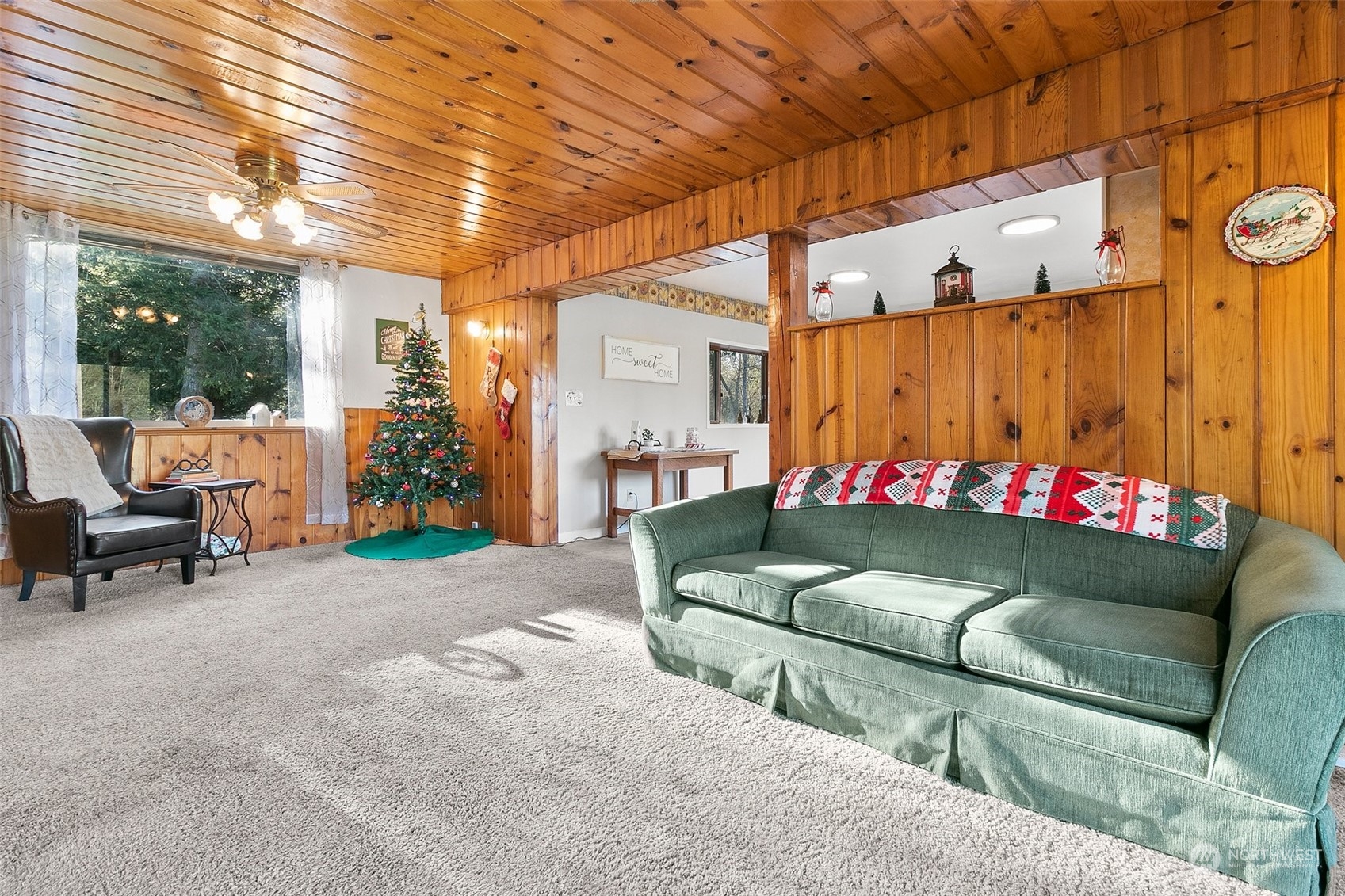 21650 Sweeney Road Southeast Maple Valley, WA 98038 - Photo 15 of 36 a living room with furniture and a couch
