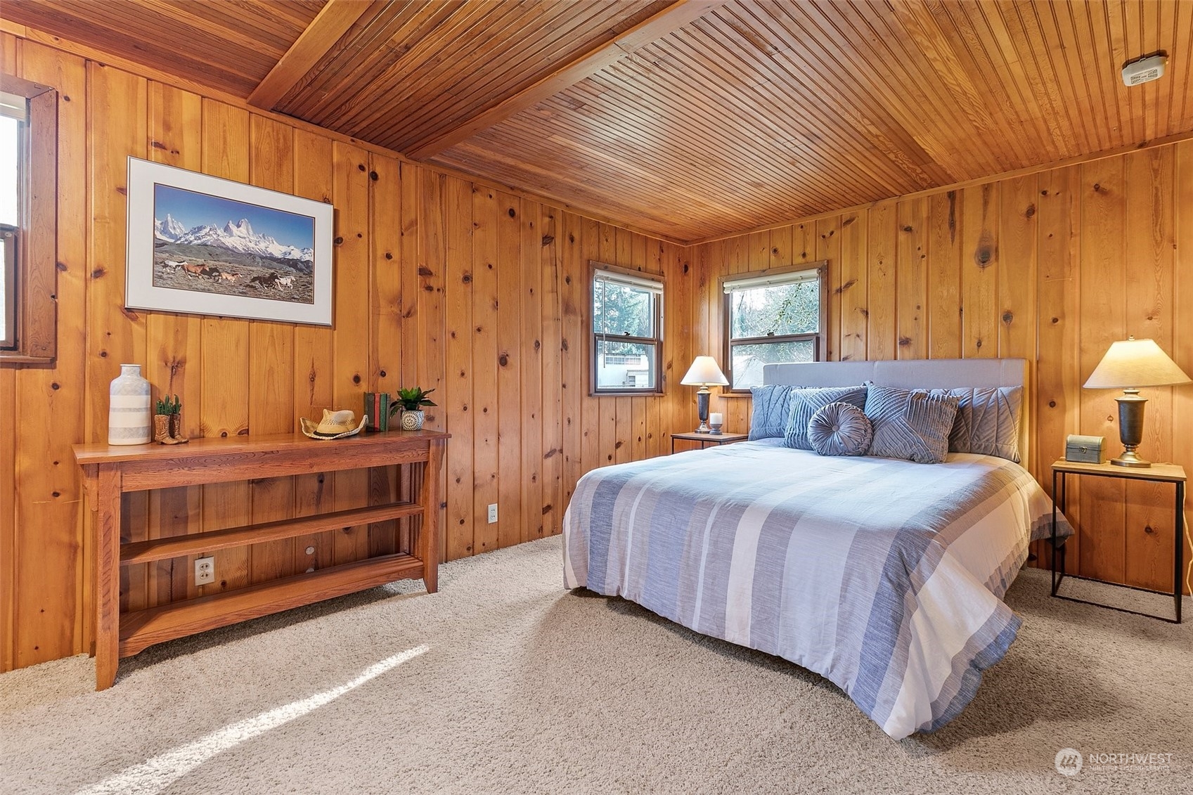 21650 Sweeney Road Southeast Maple Valley, WA 98038 - Photo 19 of 36 a bedroom with a bed and a dresser