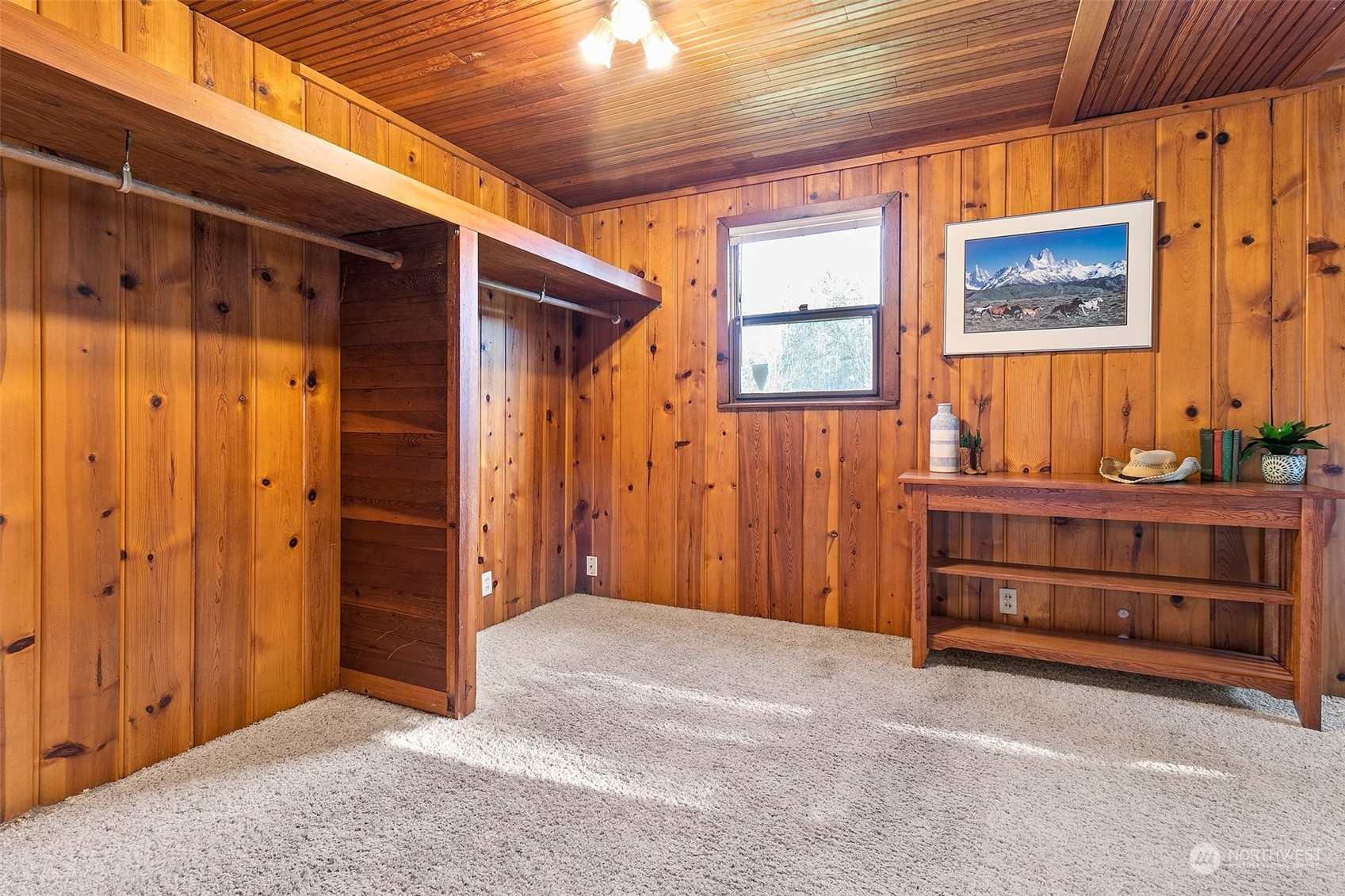 21650 Sweeney Road Southeast Maple Valley, WA 98038 - Photo 20 of 36 a view of room with a window and dresser