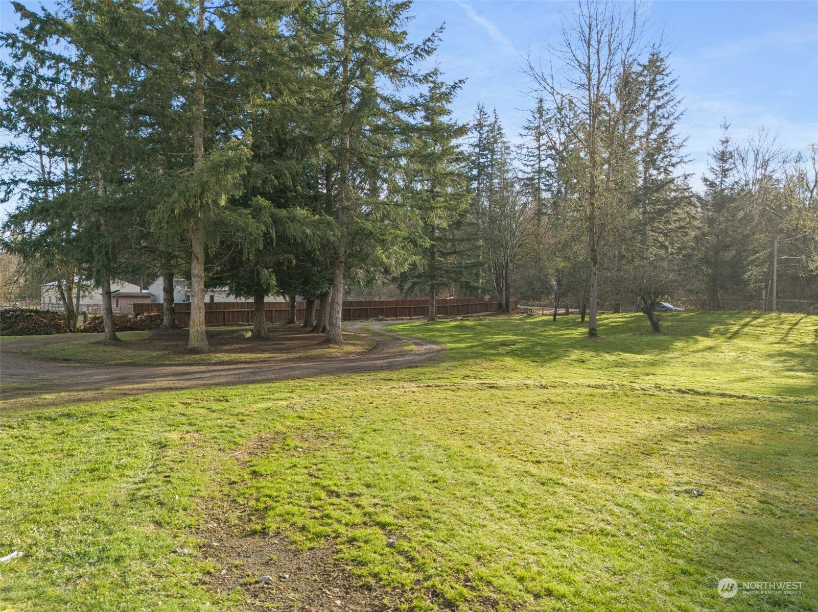 21650 Sweeney Road Southeast Maple Valley, WA 98038 - Photo 27 of 36 a view of outdoor space with swimming pool and trees