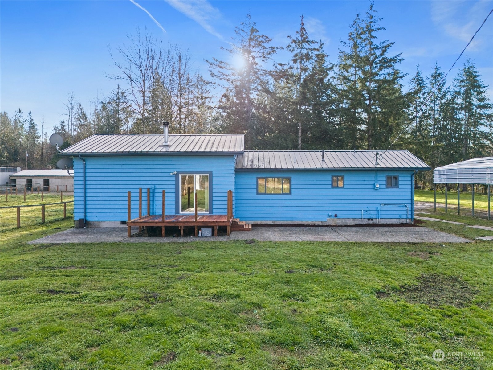 21650 Sweeney Road Southeast Maple Valley, WA 98038 - Photo 28 of 36 a front view of a house with a garden