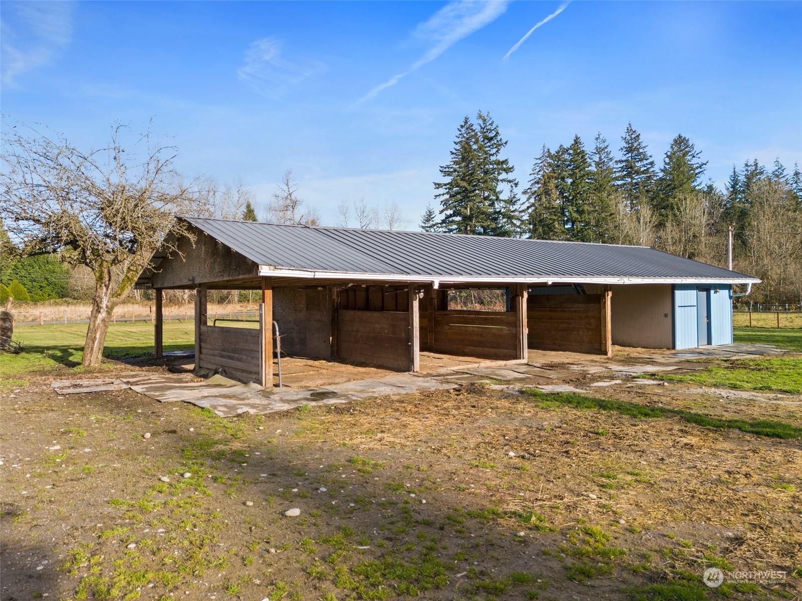 21650 Sweeney Road Southeast Maple Valley, WA 98038 - Photo 29 of 36 a front view of a house with a yard