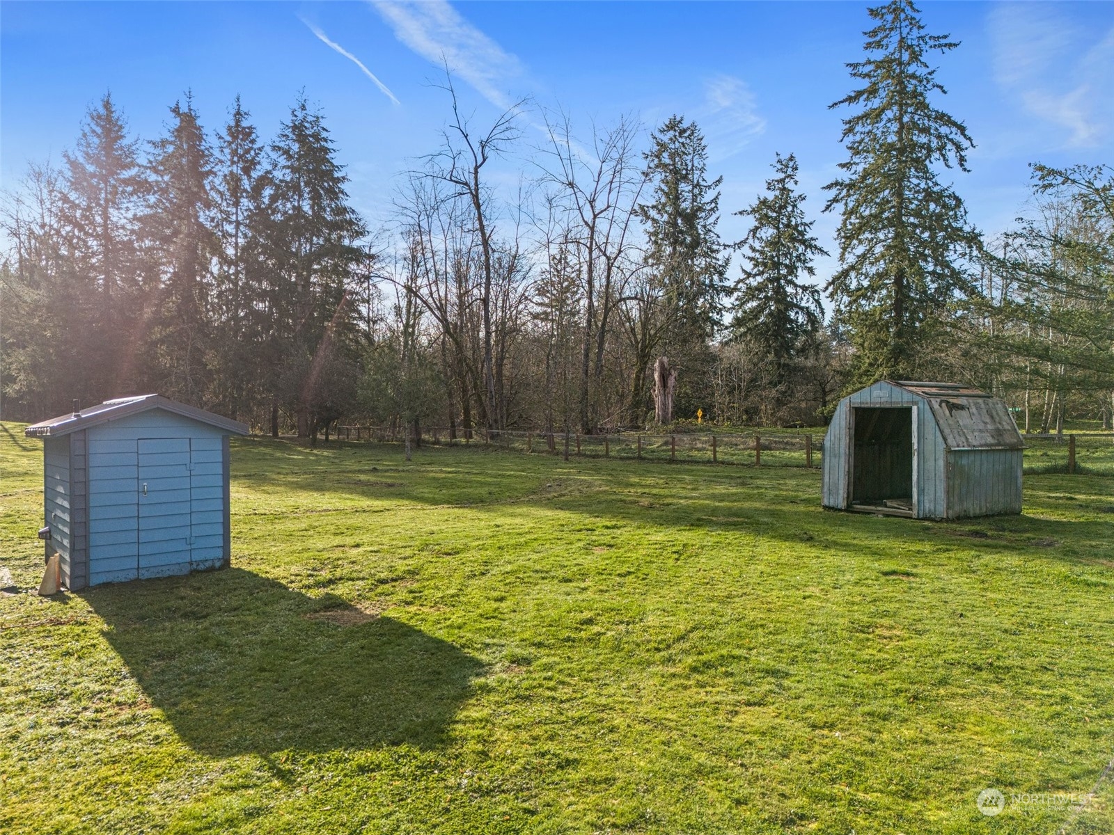 21650 Sweeney Road Southeast Maple Valley, WA 98038 - Photo 33 of 36 a view of a backyard