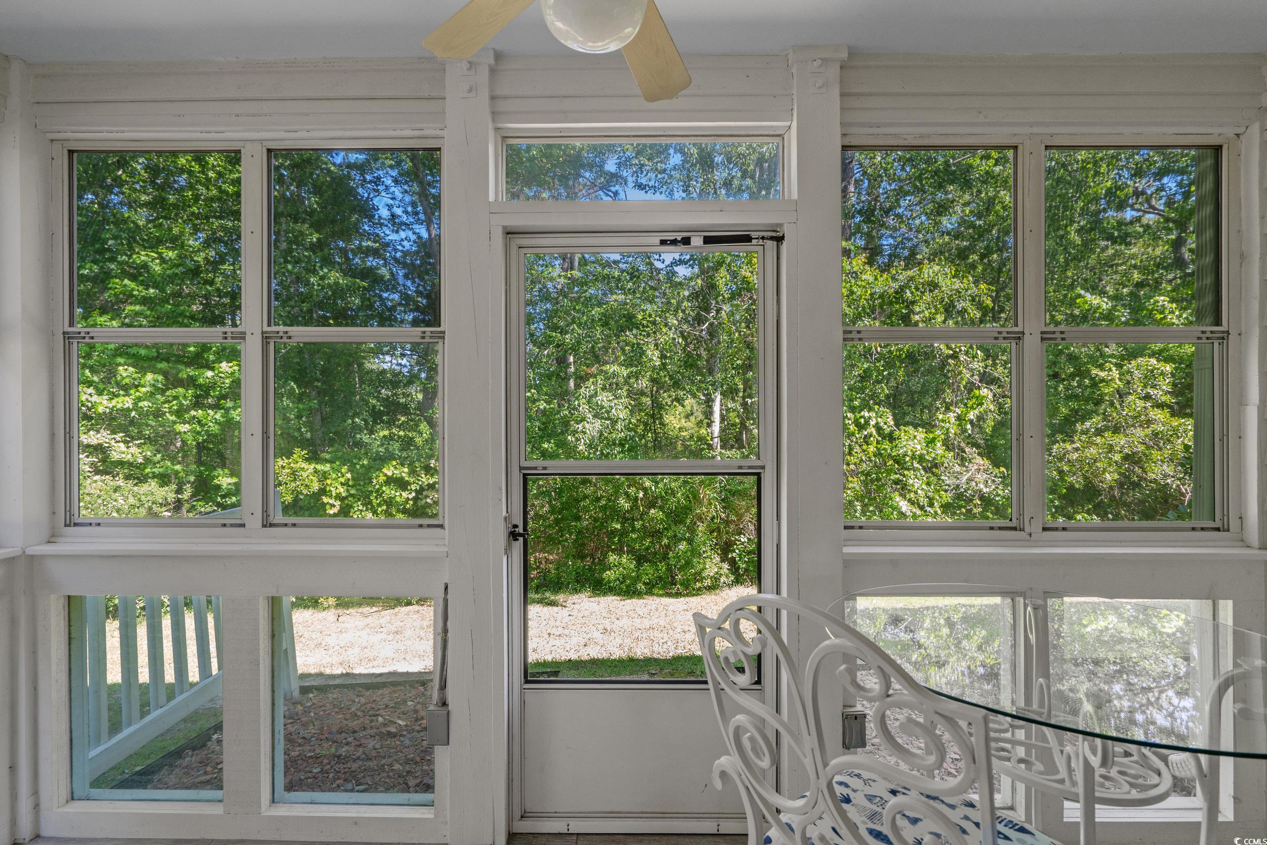 1290 White Tree Lane Myrtle Beach, SC 29588 - Photo 32 of 33 Kitchen with stainless steel appliances, backsplash, a peninsula, a textured ceiling, and open floor plan
