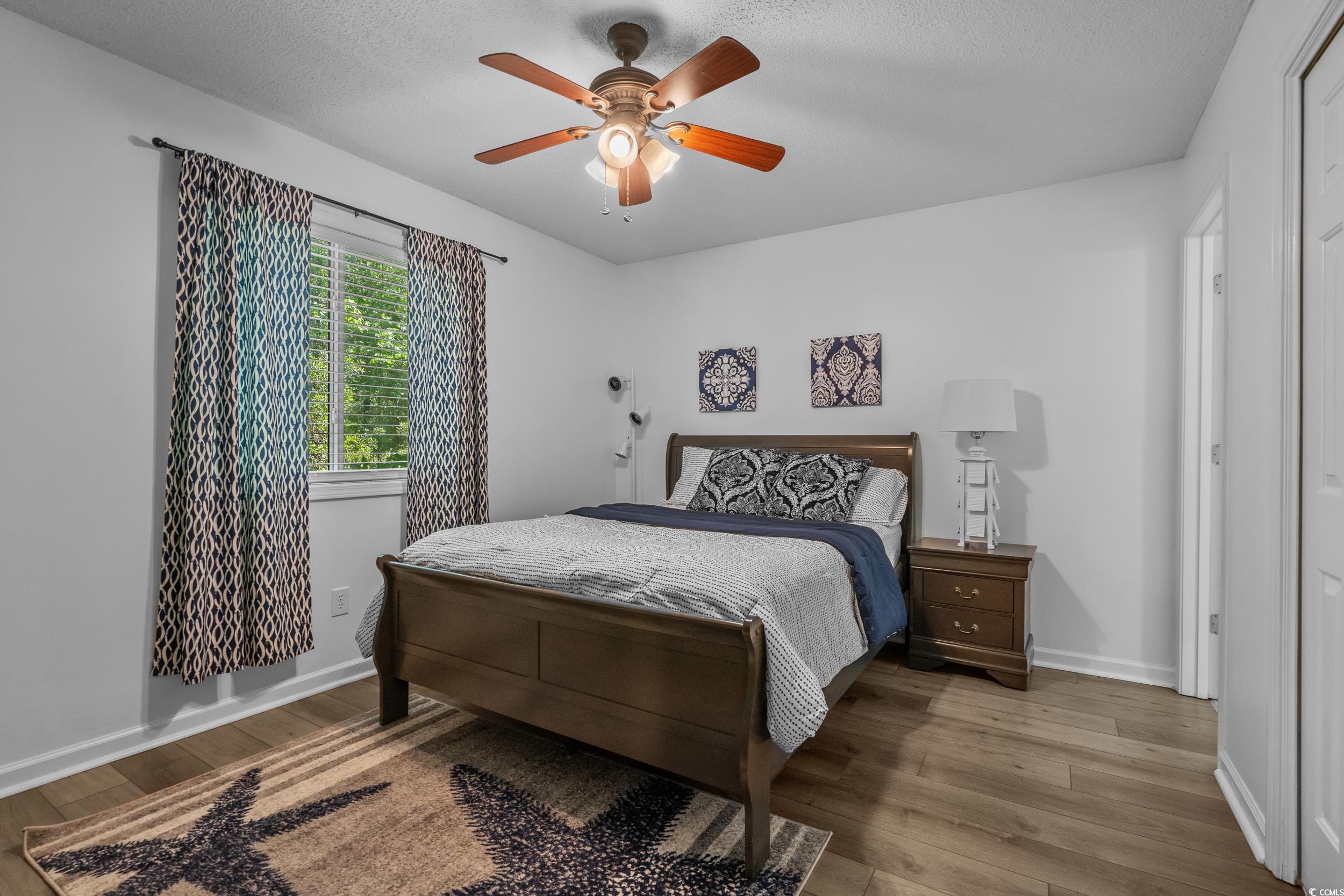 1290 White Tree Lane Myrtle Beach, SC 29588 - Photo 17 of 33 Sunroom featuring a ceiling fan and healthy amount of natural light