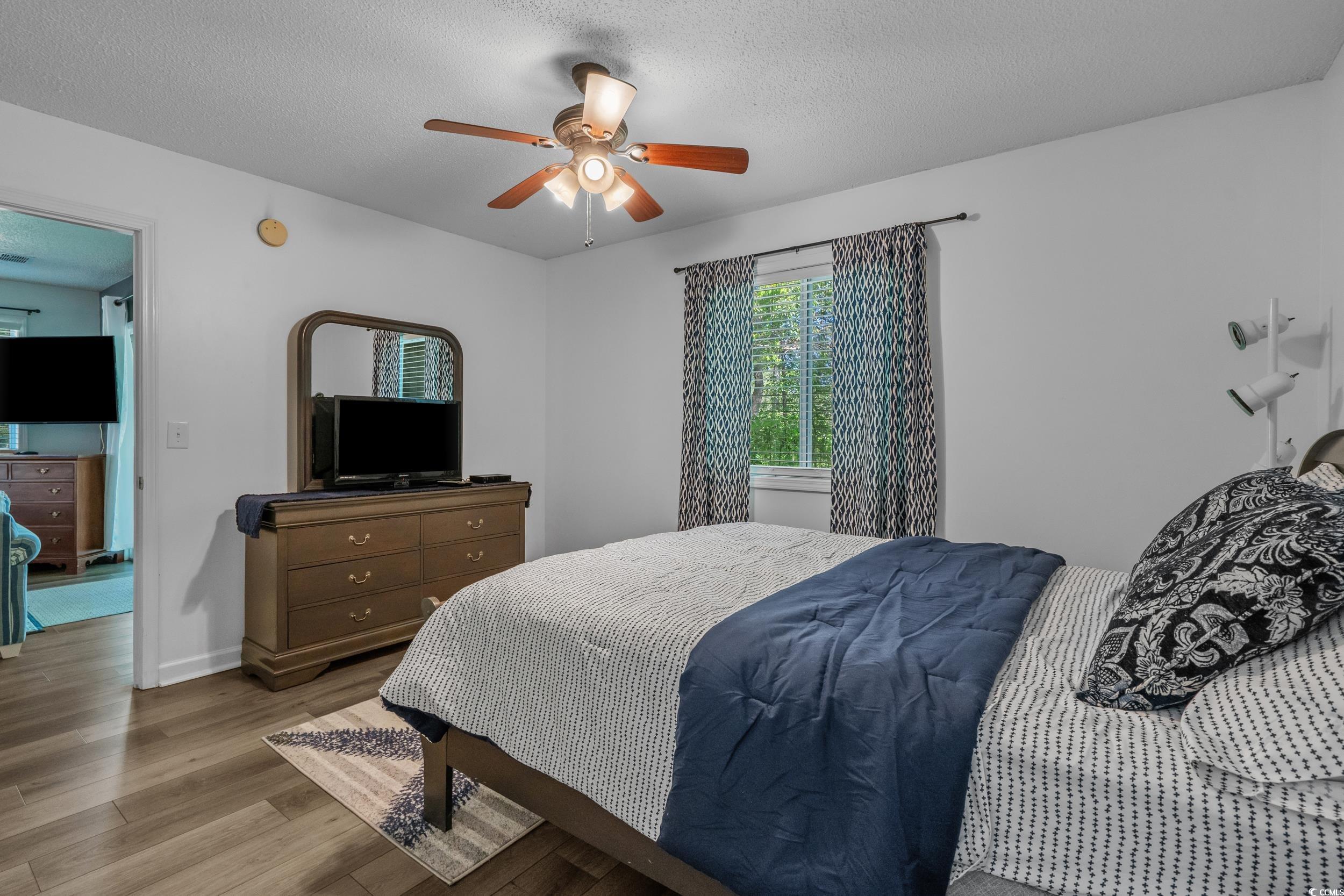 1290 White Tree Lane Myrtle Beach, SC 29588 - Photo 18 of 33 Sunroom featuring ceiling fan and healthy amount of natural light