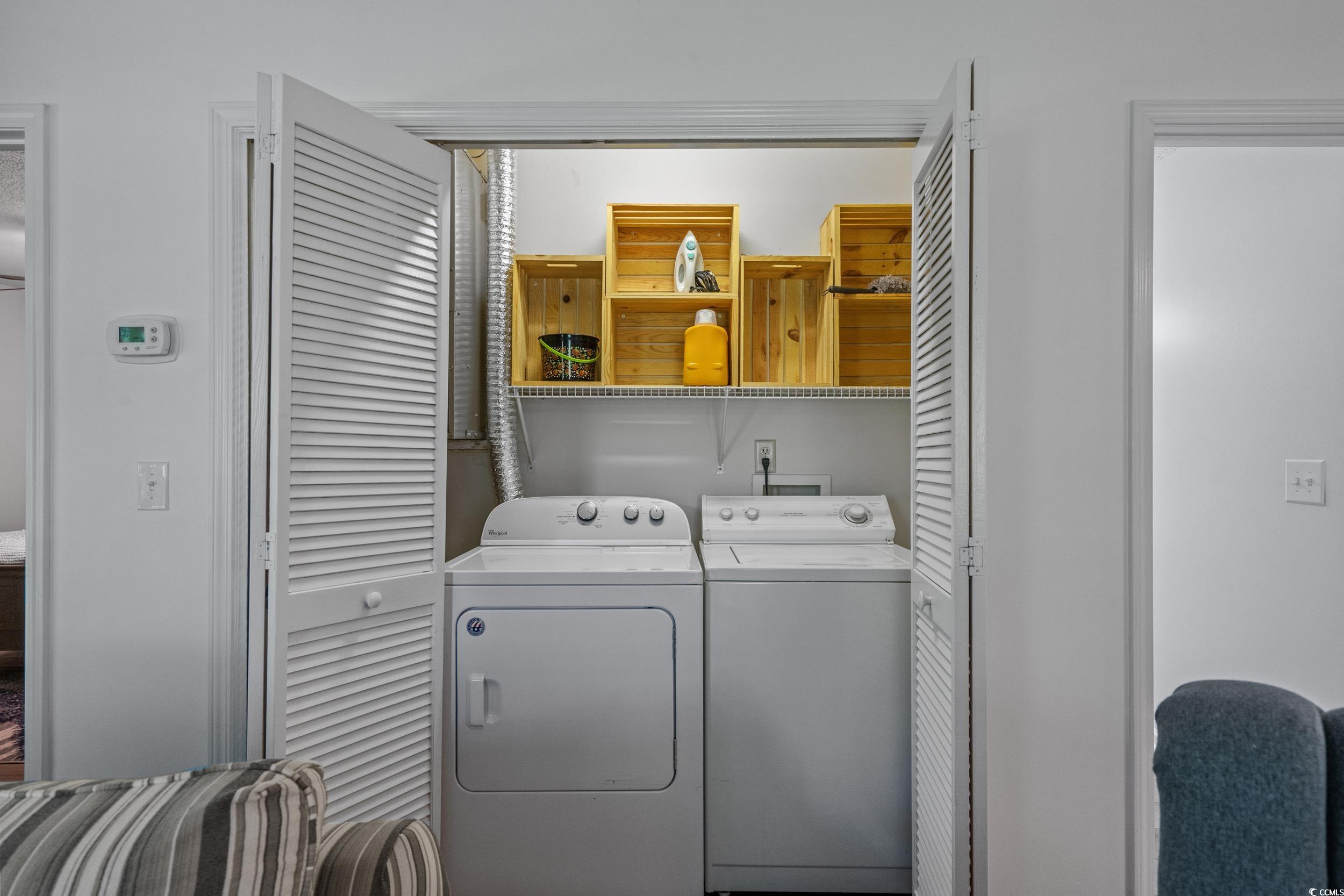 1290 White Tree Lane Myrtle Beach, SC 29588 - Photo 24 of 33 Bedroom featuring a ceiling fan, light wood-style floors, and a textured ceiling