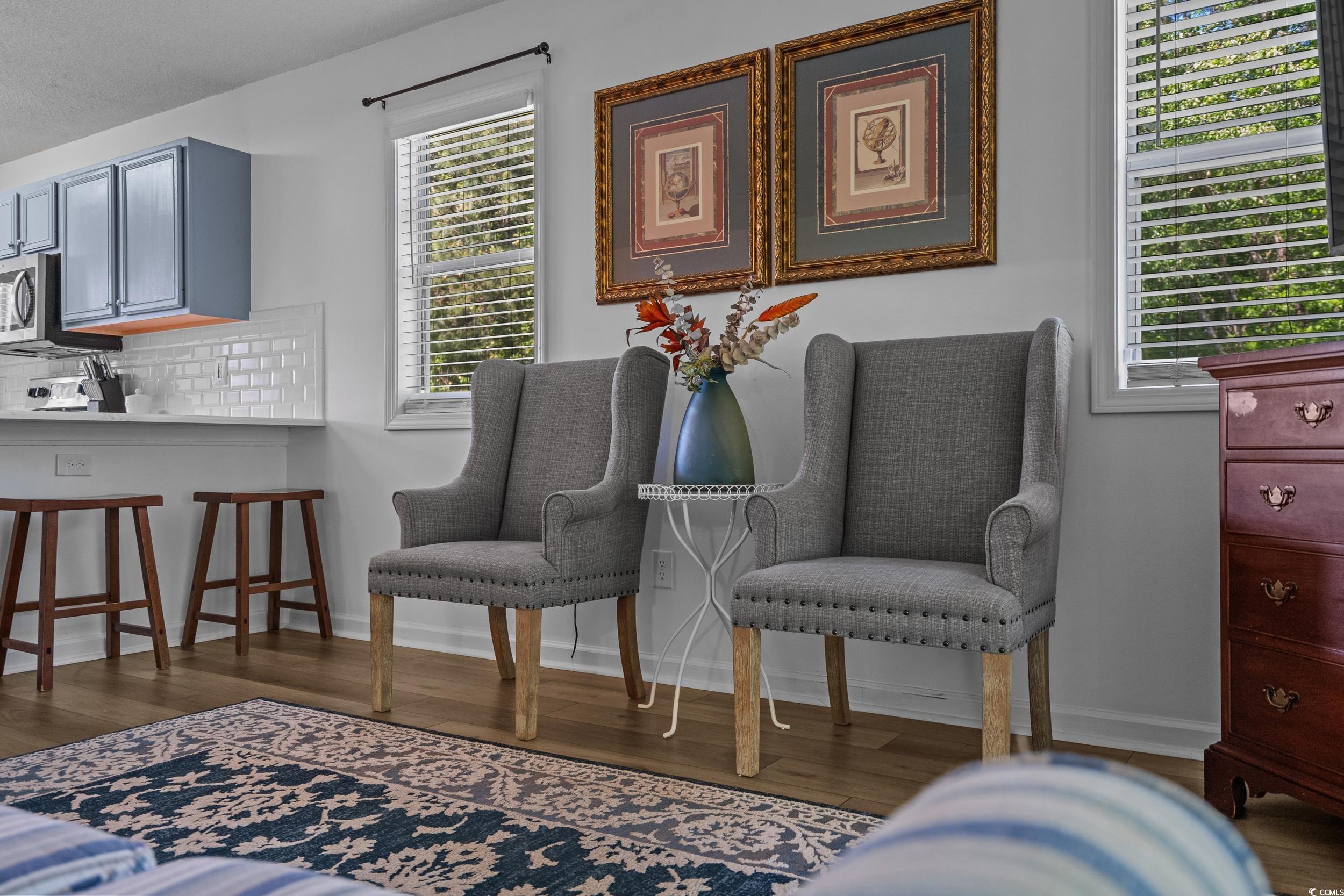 1290 White Tree Lane Myrtle Beach, SC 29588 - Photo 26 of 33 Full bathroom with shower / bath combo, decorative backsplash, vanity, a textured ceiling, and dark wood-type flooring