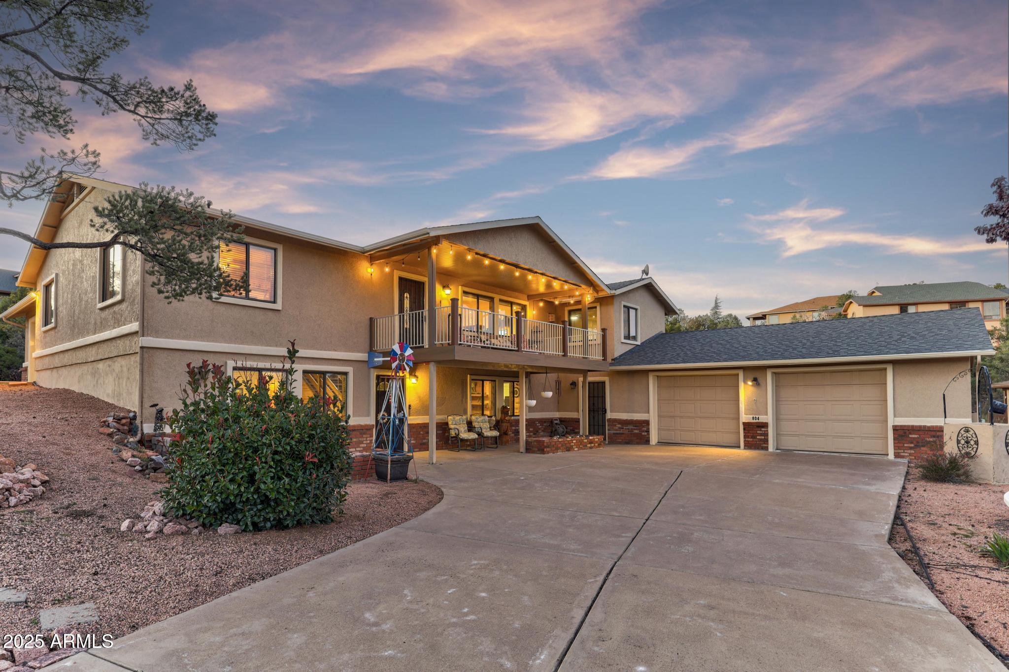 a view of house with a yard