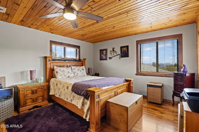 a bathroom with a double vanity sink toilet and shower