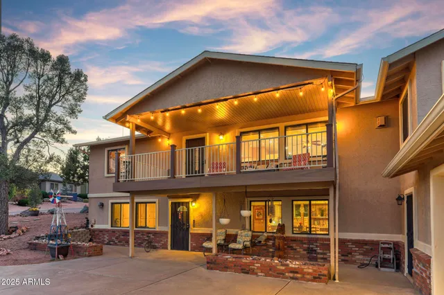 a view of a building with sitting area