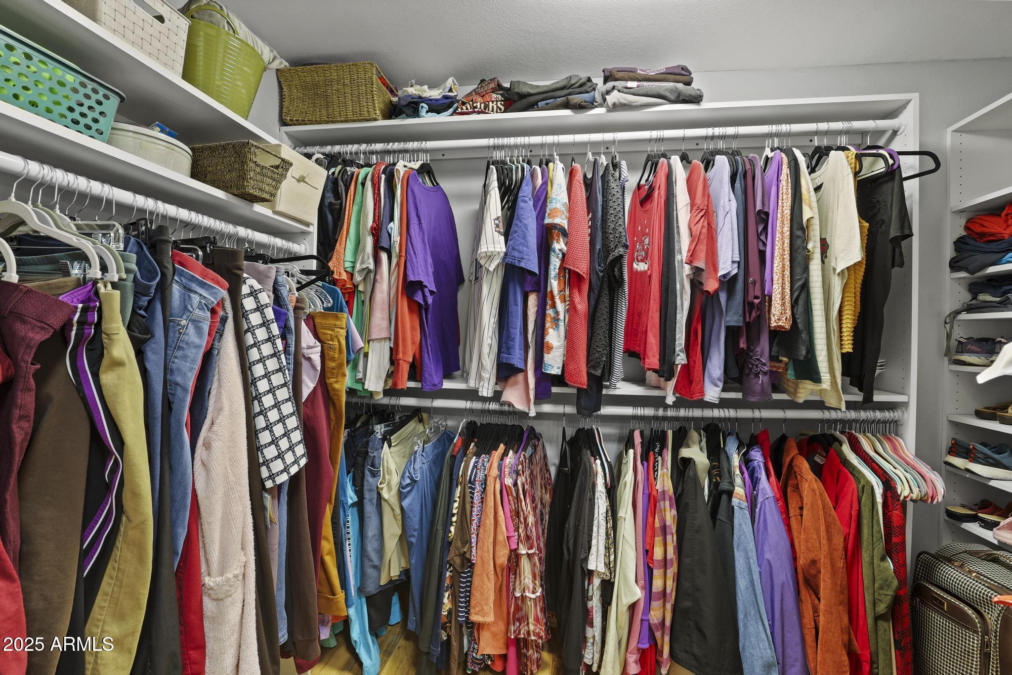 804 East Phoenix Street Payson, AZ 85541 - Photo 22 of 56 a view of walk in closet with clothes