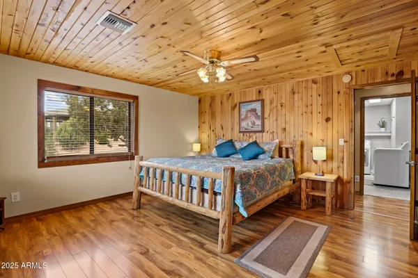 a bathroom with a sink a mirror and a shower