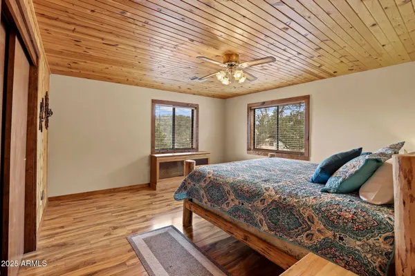 a view of storage and utility room with washer and dryer