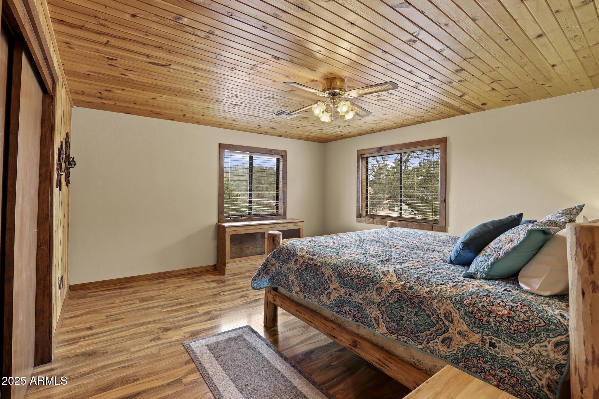 804 East Phoenix Street Payson, AZ 85541 - Photo 24 of 56 a bedroom with a bed and a window