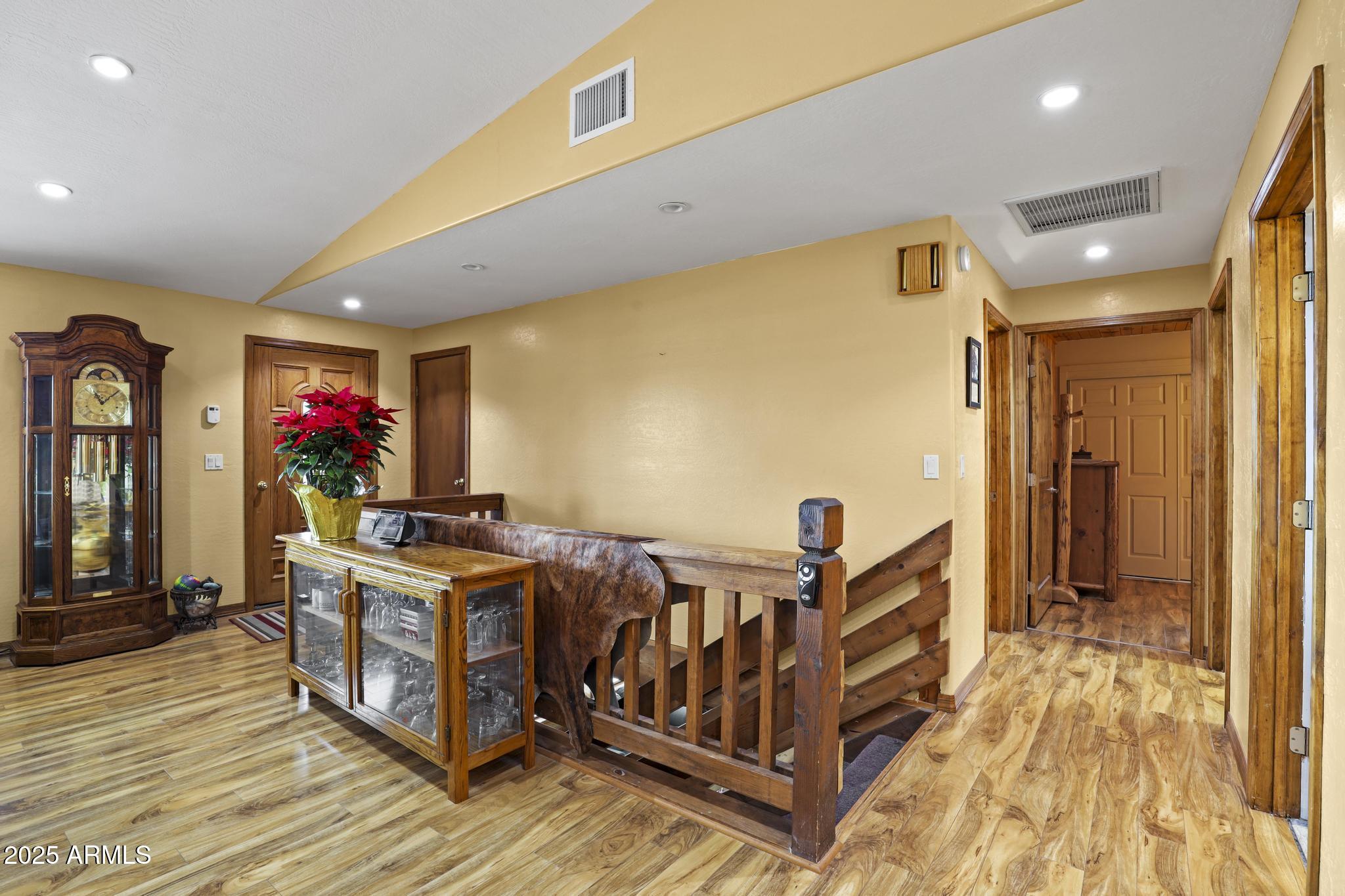 804 East Phoenix Street Payson, AZ 85541 - Photo 28 of 56 a bed room with a bed and a dresser