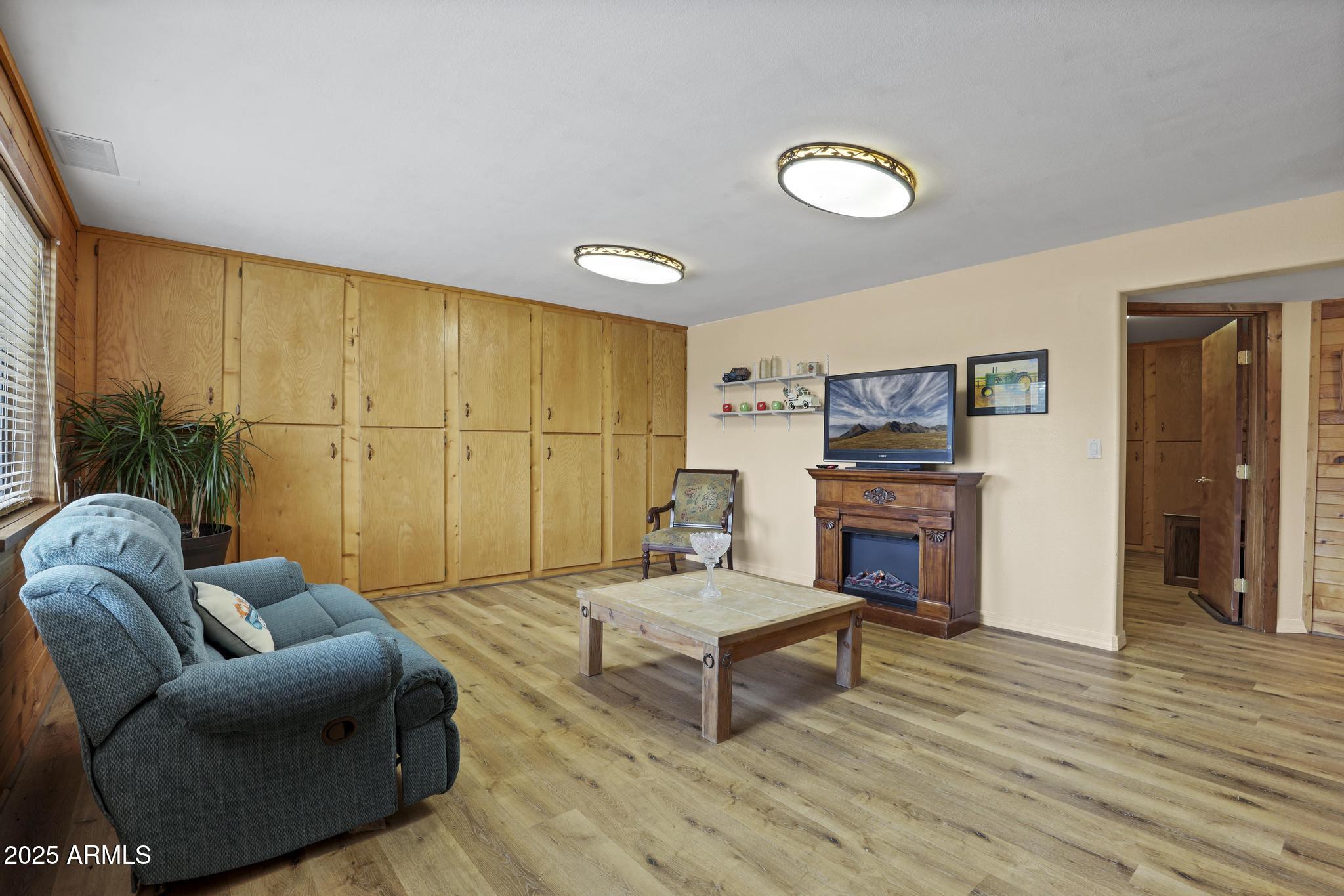 804 East Phoenix Street Payson, AZ 85541 - Photo 30 of 56 a living room with furniture and a fireplace