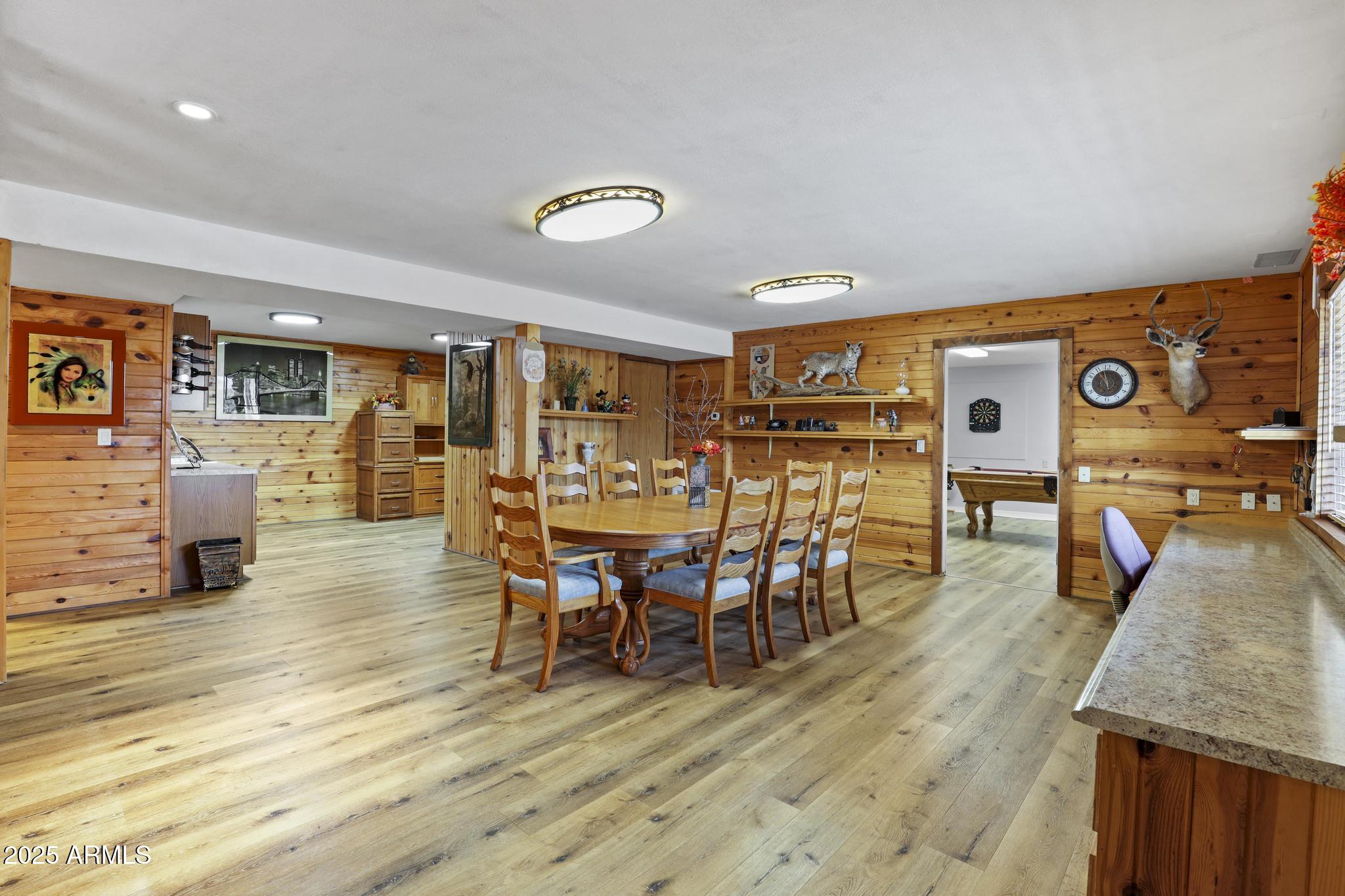804 East Phoenix Street Payson, AZ 85541 - Photo 33 of 56 a view of a dining room with furniture and wooden floor