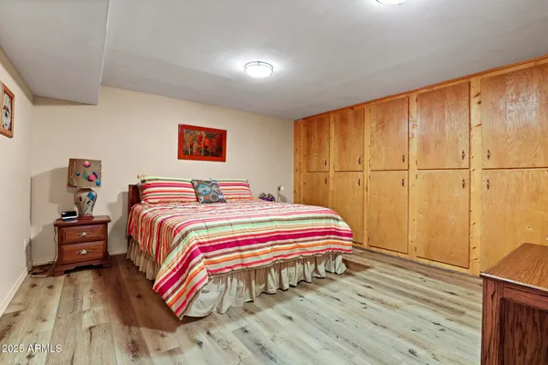 a view of kitchen with furniture and wooden floor