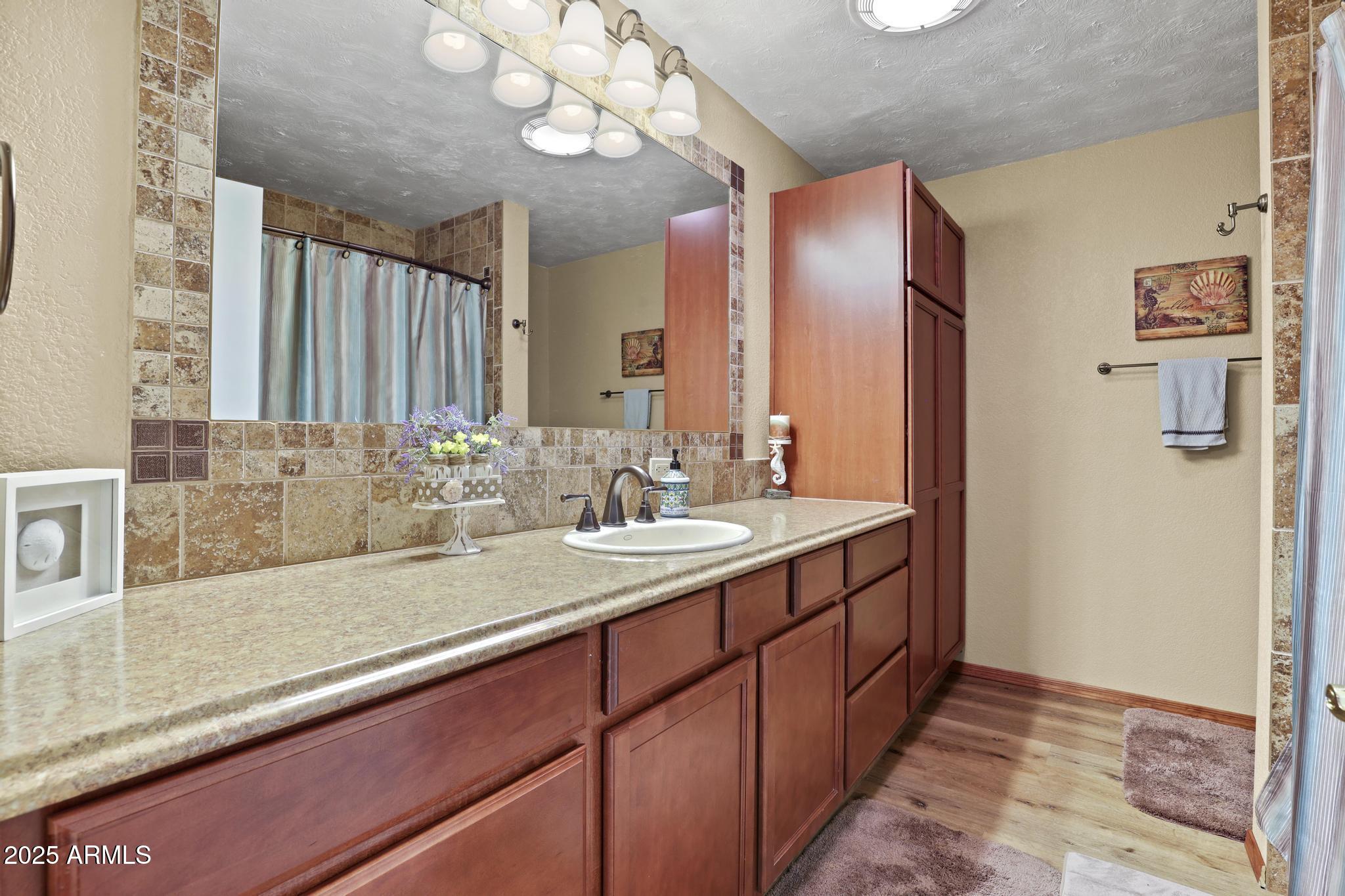 804 East Phoenix Street Payson, AZ 85541 - Photo 35 of 56 a bathroom with a sink and a mirror