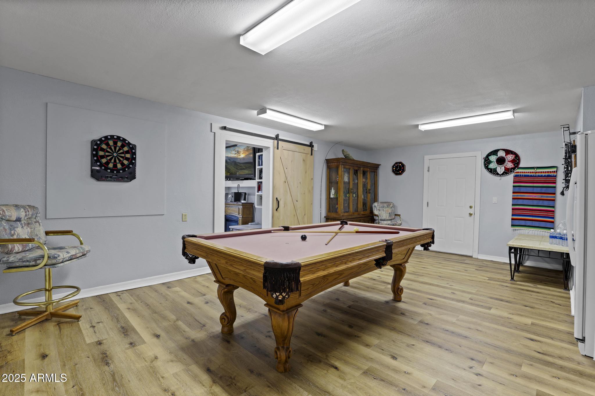 804 East Phoenix Street Payson, AZ 85541 - Photo 39 of 56 a room with furniture pool table and paintings on the wall