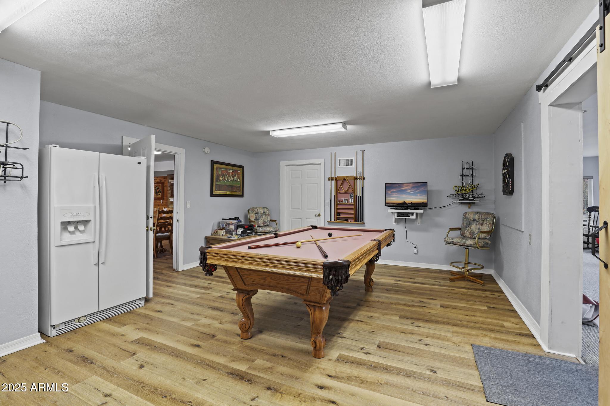 804 East Phoenix Street Payson, AZ 85541 - Photo 40 of 56 a room with furniture pool table and wooden floor