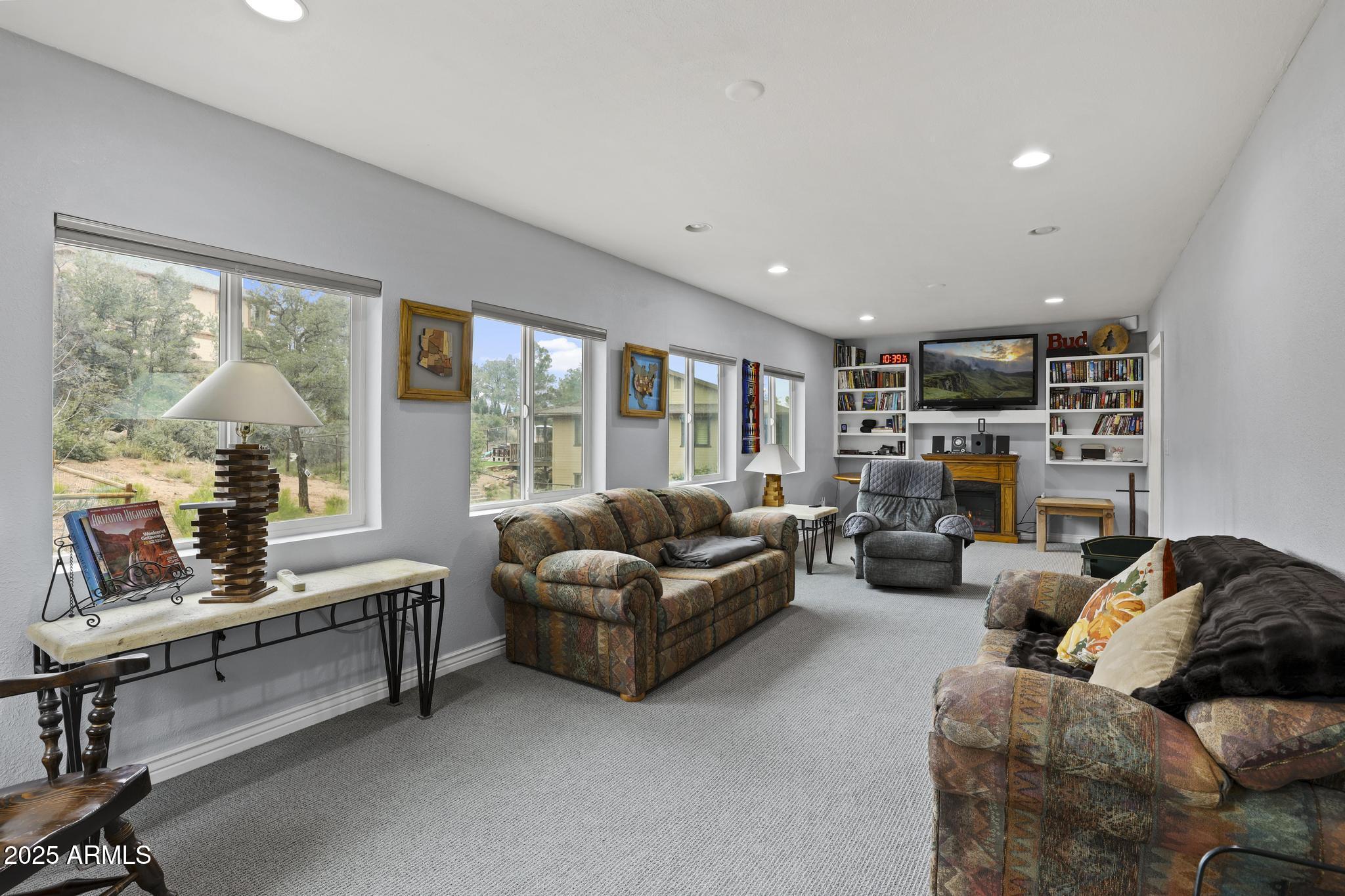 804 East Phoenix Street Payson, AZ 85541 - Photo 42 of 56 a living room with furniture and a fireplace