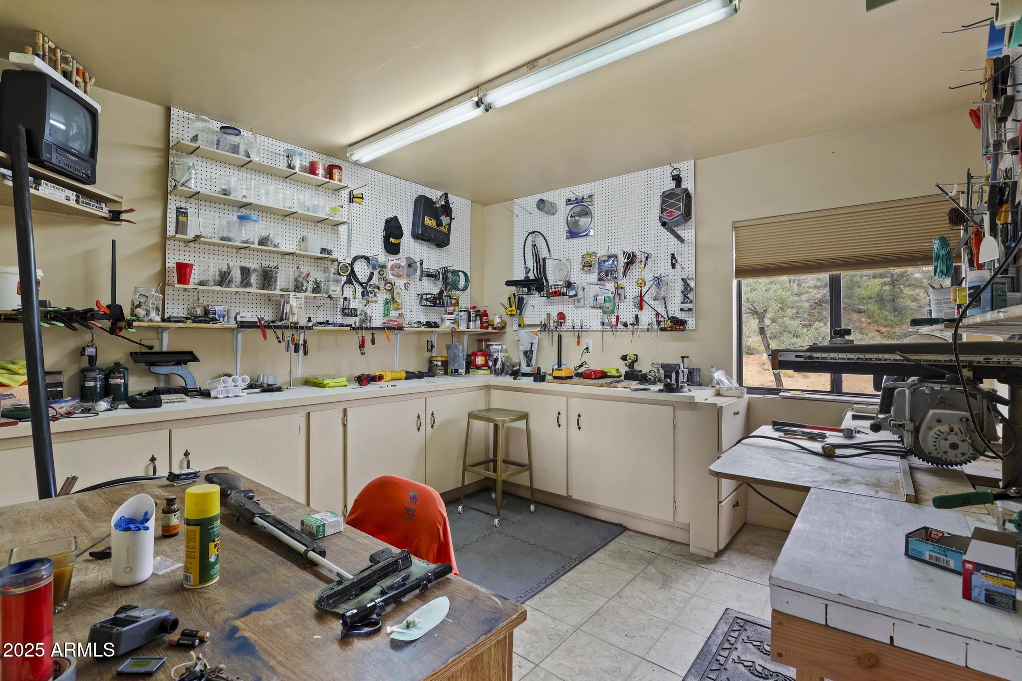 804 East Phoenix Street Payson, AZ 85541 - Photo 43 of 56 a kitchen with white cabinets and window
