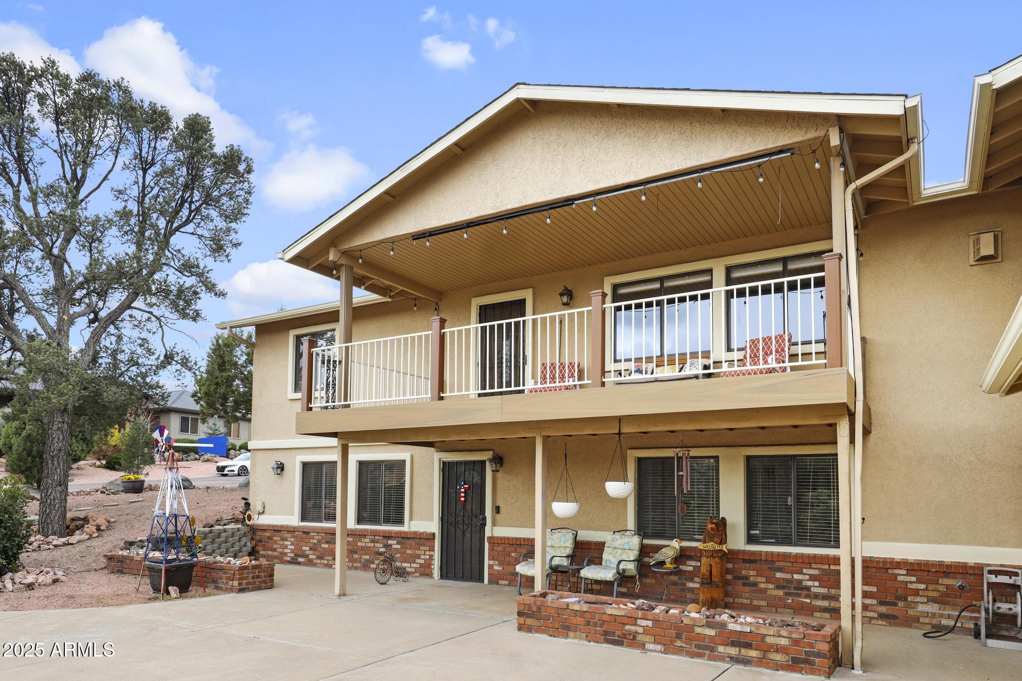 804 East Phoenix Street Payson, AZ 85541 - Photo 55 of 56 a front view of a house with basket ball court and a garage