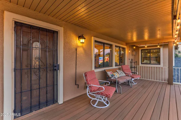 a view of a city with lush green forest
