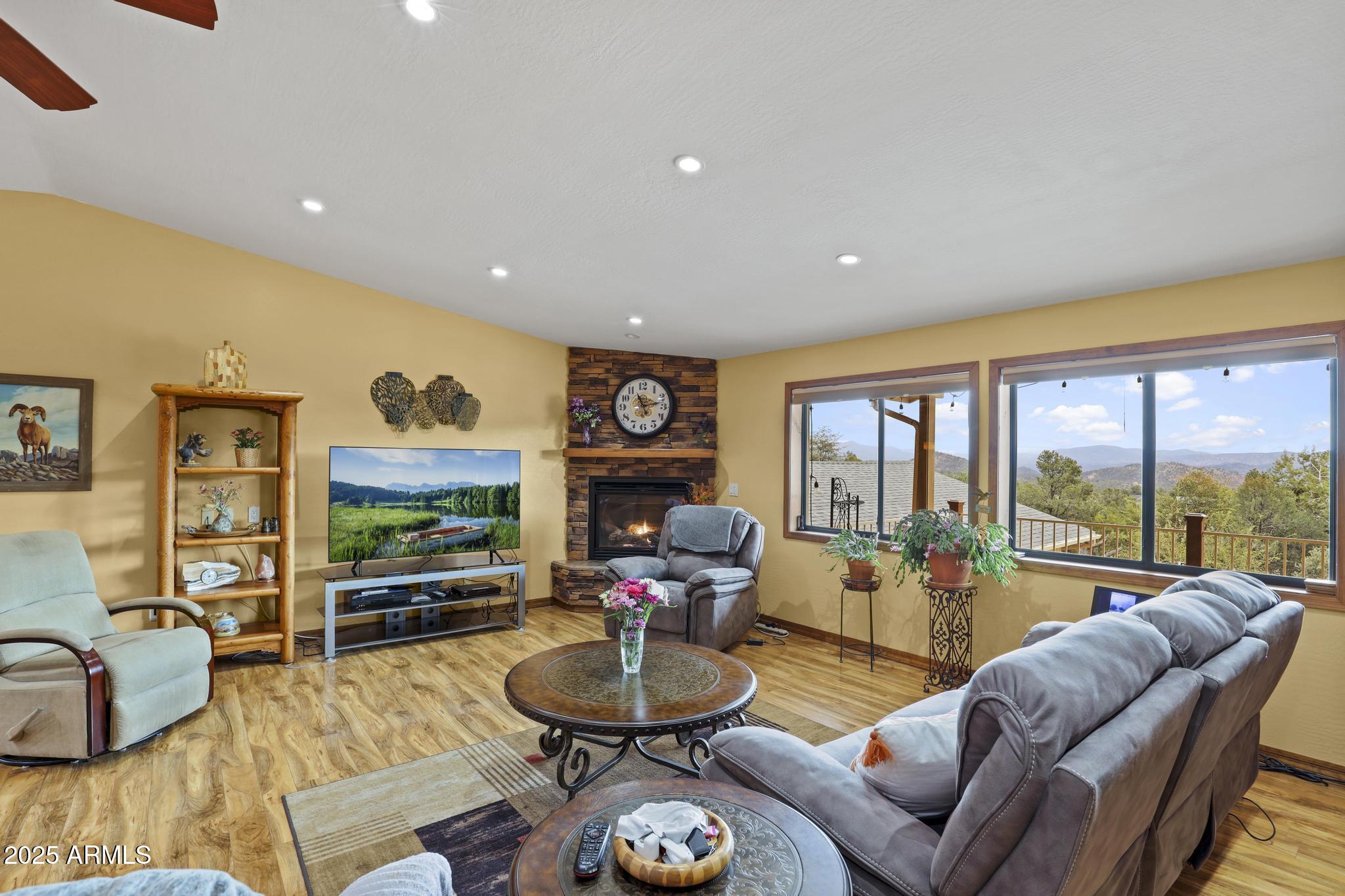804 East Phoenix Street Payson, AZ 85541 - Photo 10 of 56 a living room with furniture and a flat screen tv