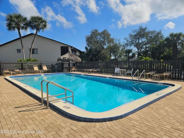 a view of a house with swimming pool
