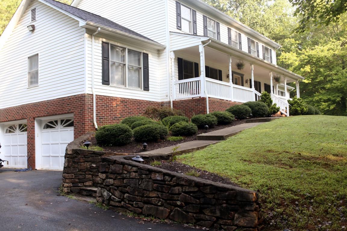 3535 Ingramville Road Ferrum, VA 24088 - Photo 4 of 43 a front view of a house with a yard