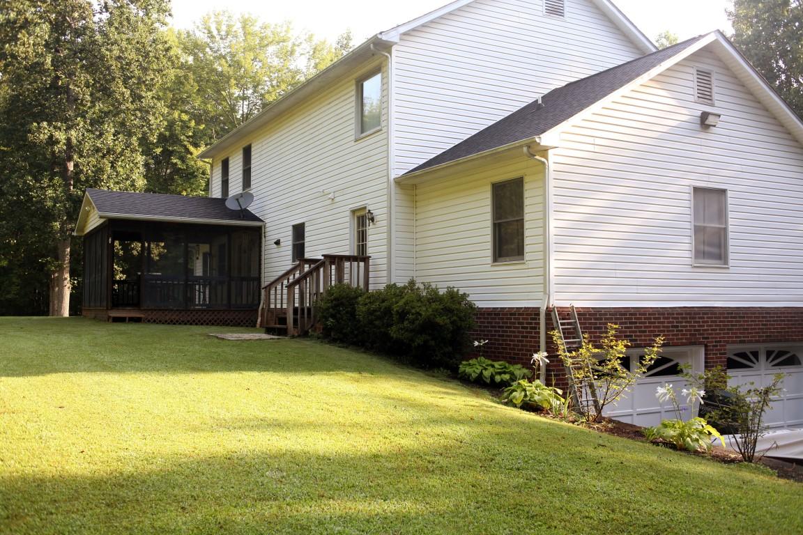 3535 Ingramville Road Ferrum, VA 24088 - Photo 6 of 43 a view of a house with backyard and sitting area