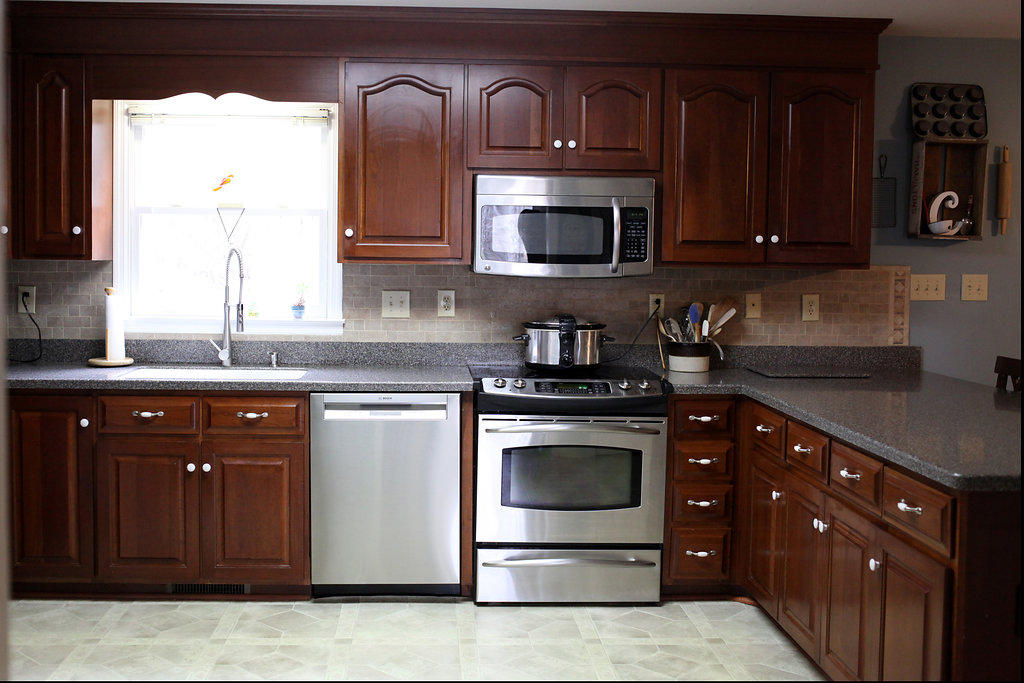 3535 Ingramville Road Ferrum, VA 24088 - Photo 10 of 43 a kitchen with stainless steel appliances granite countertop a stove a sink and a microwave
