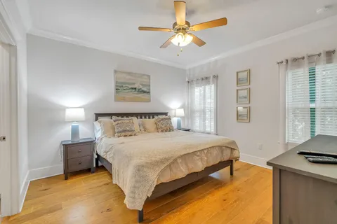 a bathroom with a double vanity sink mirror and shower