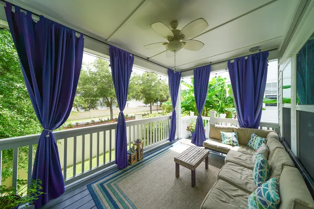 a view of a hallway with wooden floor and closet