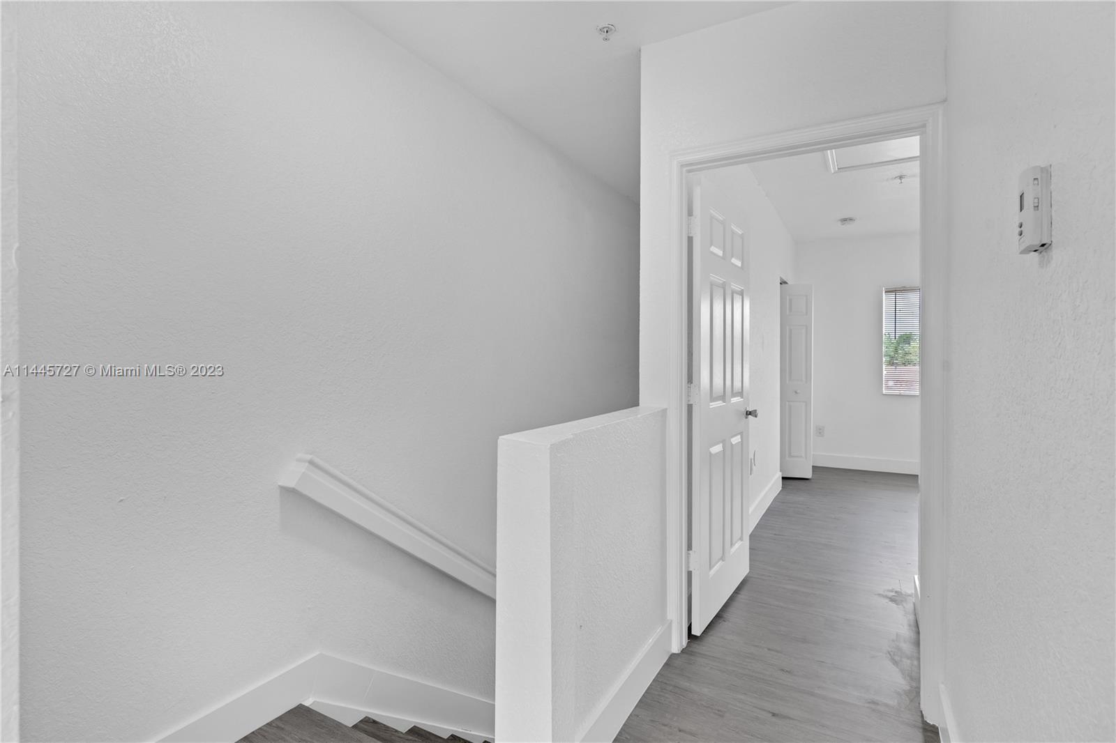 7989 Northwest 8th Street, Unit 110 Miami, FL 33126 - Photo 19 of 24 a view of an empty room