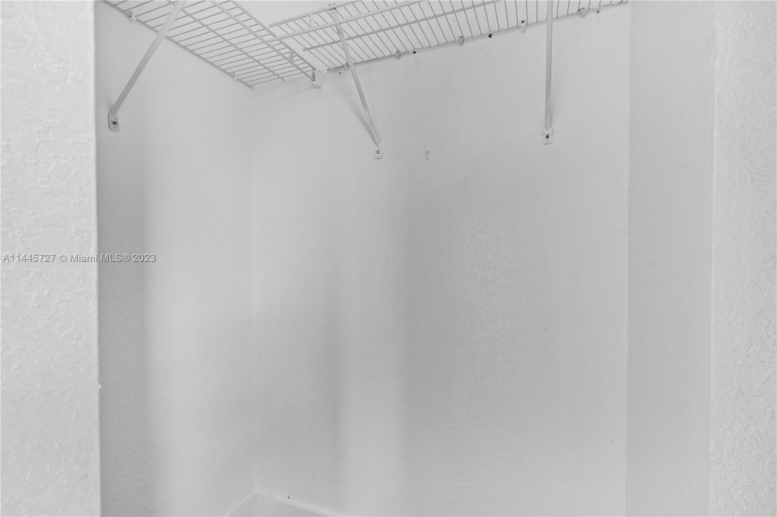 7989 Northwest 8th Street, Unit 110 Miami, FL 33126 - Photo 24 of 24 a view of a rack on the wall