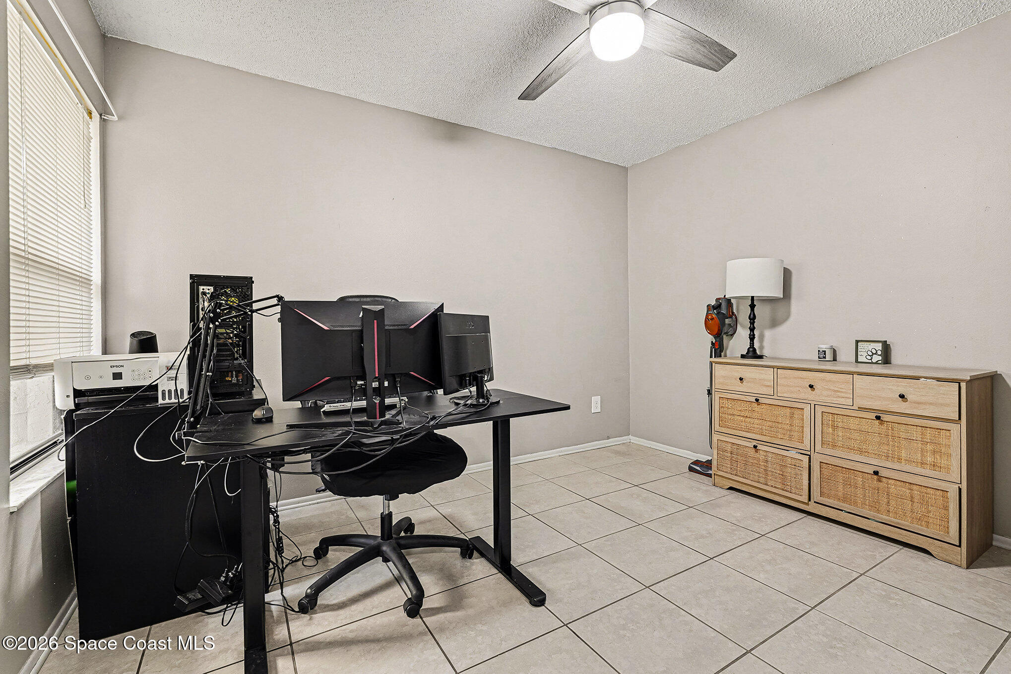 1491 Sheafe Avenue Northeast, Unit 104 Palm Bay, FL 32905 - Photo 9 of 19 a kitchen with appliances cabinets and furniture
